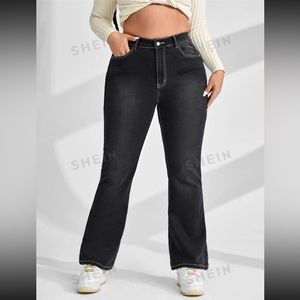 Graphic print flap pocket flare bottom jeans.